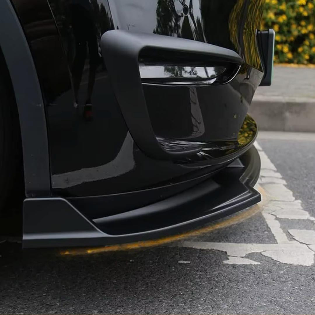matt svart tesla model y frontleppe montert på bilen