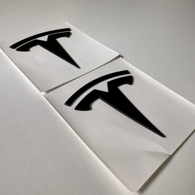 Sort tesla emblem til Model 3 og Model Y